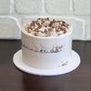 chocolate and white chocolate mud cake swirled together to create a marble mud cake, layered with white chocolate ganache. Finished with a semi naked swiss meringue buttercream, milk and white crispearls and chocolate shavings